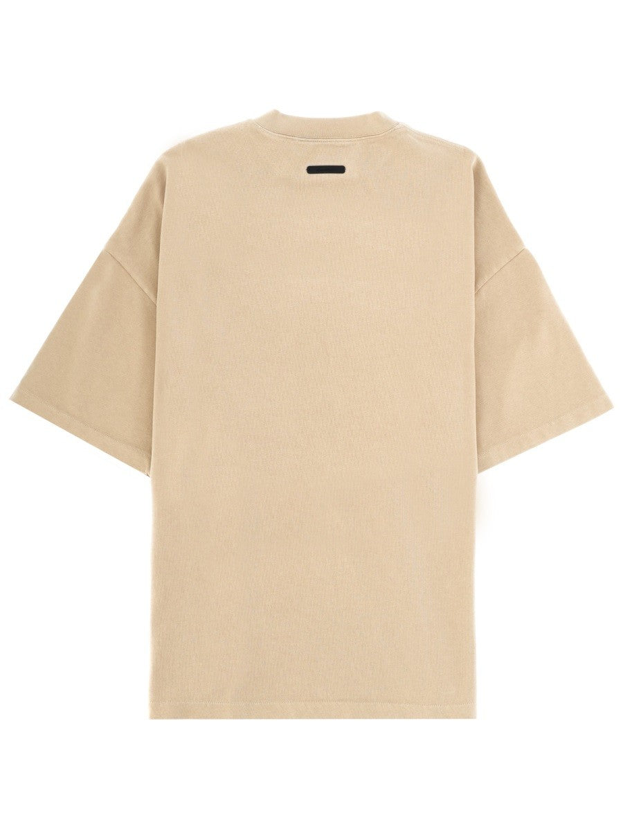 FEAR OF GOD ESSENTIALS - Man - Beige - T-shirt